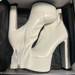 White ankle high platform boots